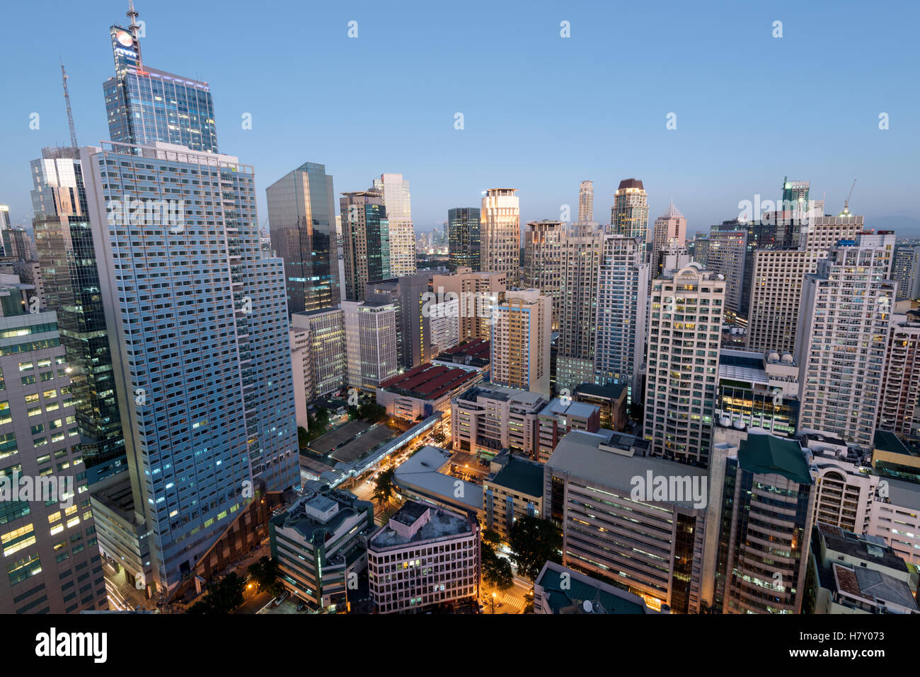 Makati Skyline at night. Makati is a city in the Philippines` Metro Manila region and the country`s financial hub. Stock Photo